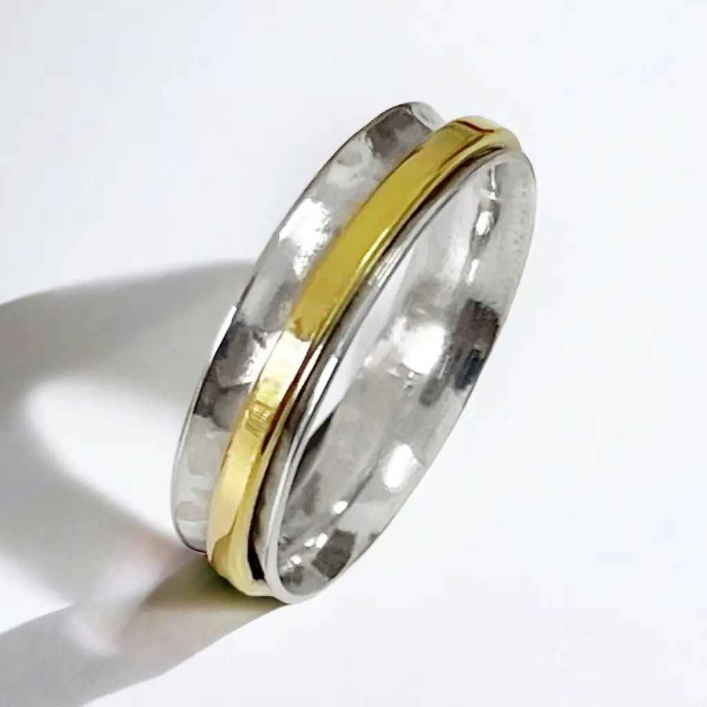 Madamlili Draairing massieve bandring gemaakt van 925 sterling zilver.
